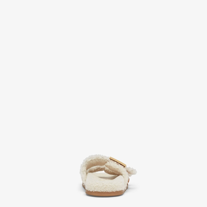 FENDI White sheepskin slides outlook
