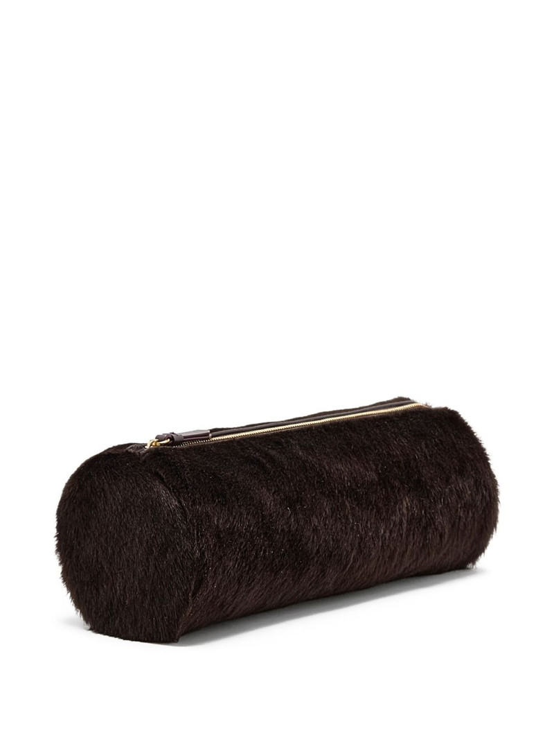 Proenza Schouler cylindrical clutch bag outlook