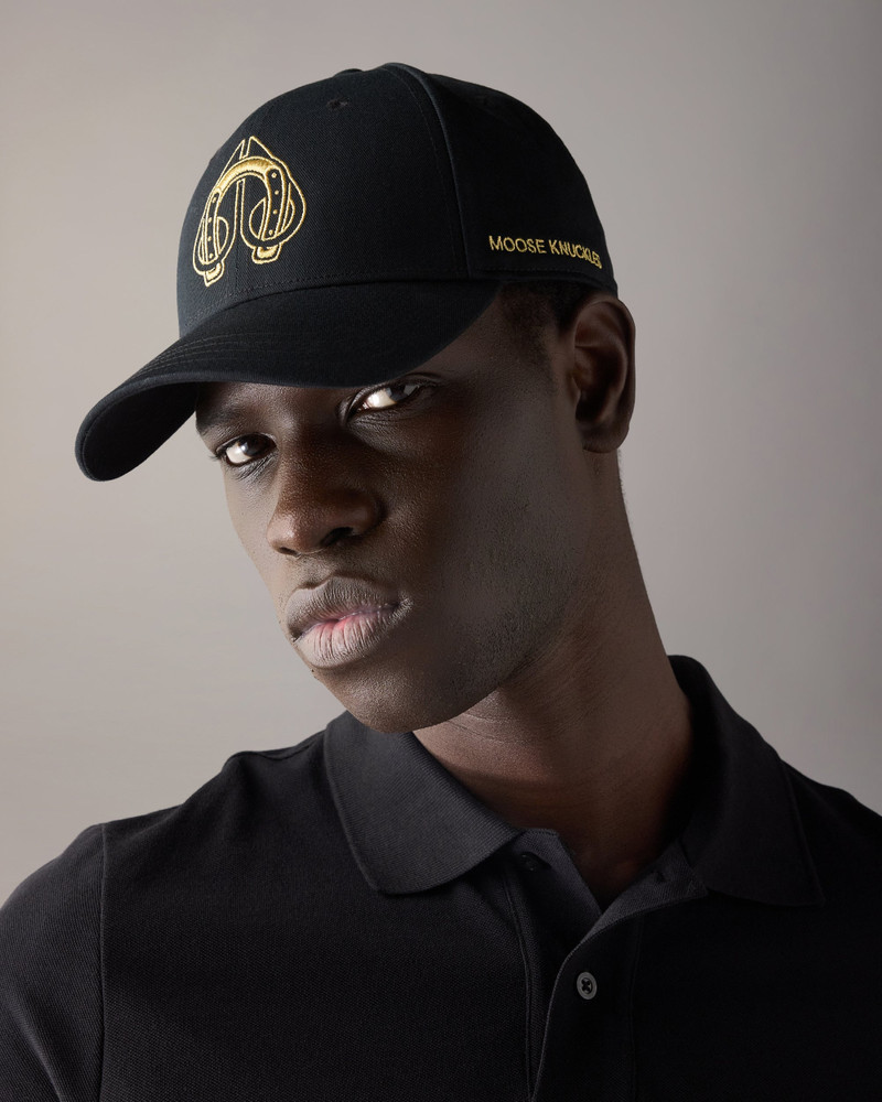 MOOSE KNUCKLES LUNAR NEW YEAR HORSESHOE CAP outlook