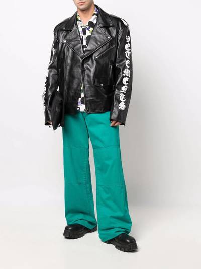 VETEMENTS spray-paint logo biker jacket outlook