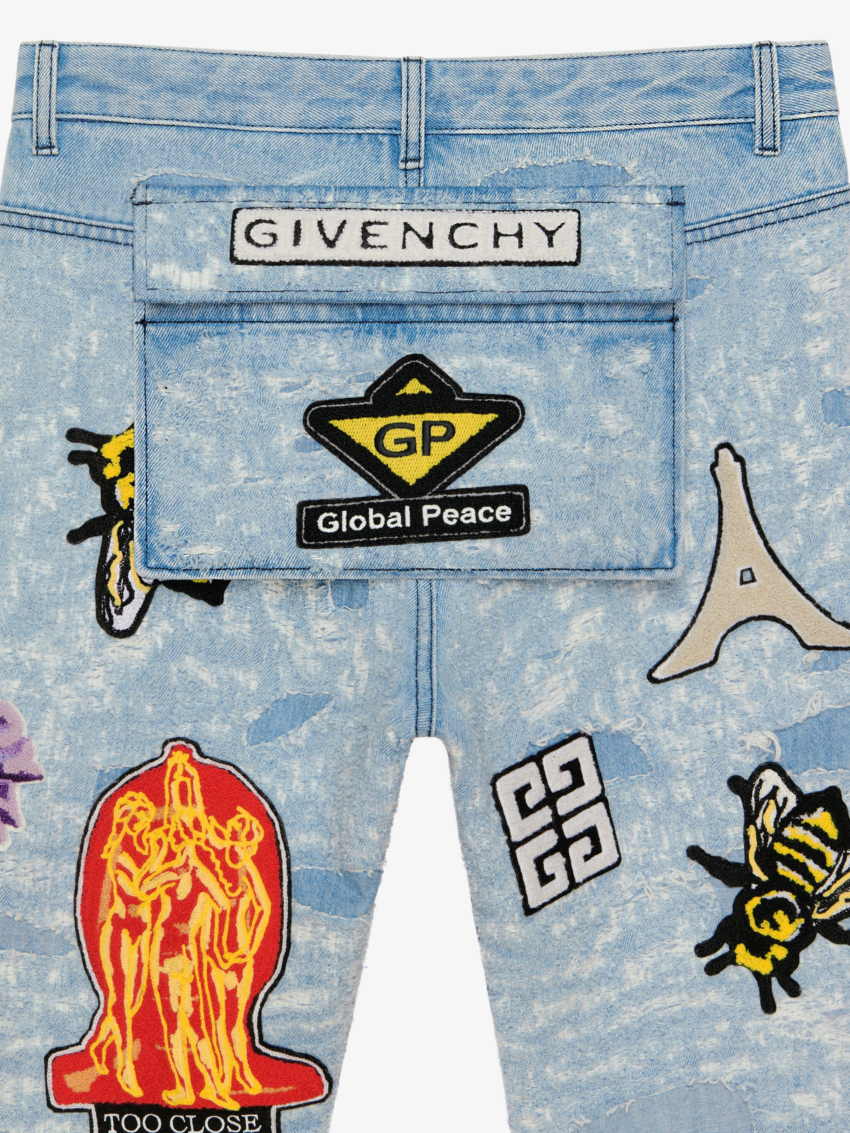 REGULAR FIT JEANS IN DESTROYED DENIM WITH PATCHES - 7