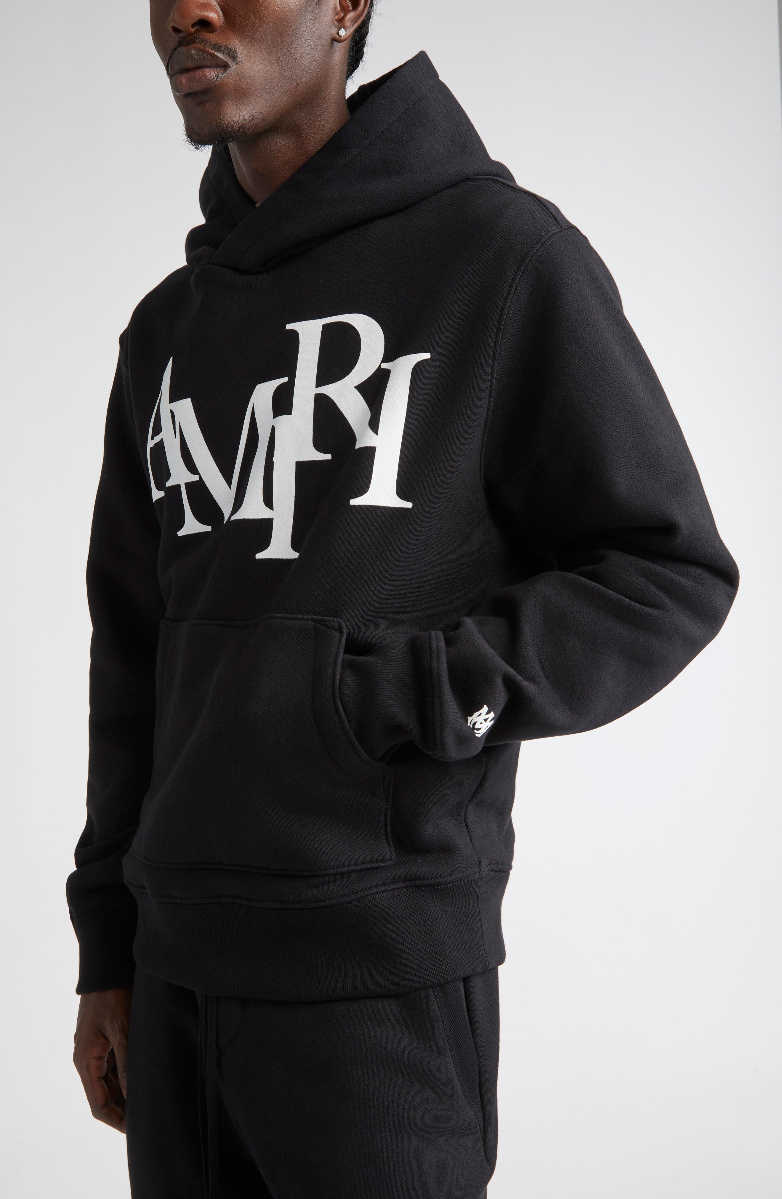 AMIRI Staggered Logo Graphic Hoodie in Black at Nordstrom - 5