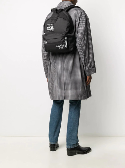 Raf Simons slogan patch backpack outlook