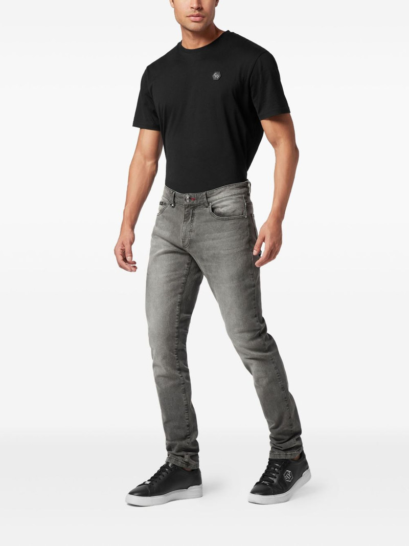 PHILIPP PLEIN logo-appliqué jeans outlook