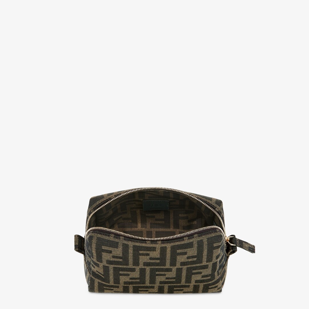 Small toiletry case with zip fastening and inside pocket. Made of fabric with iconic brown jacquard  - 3