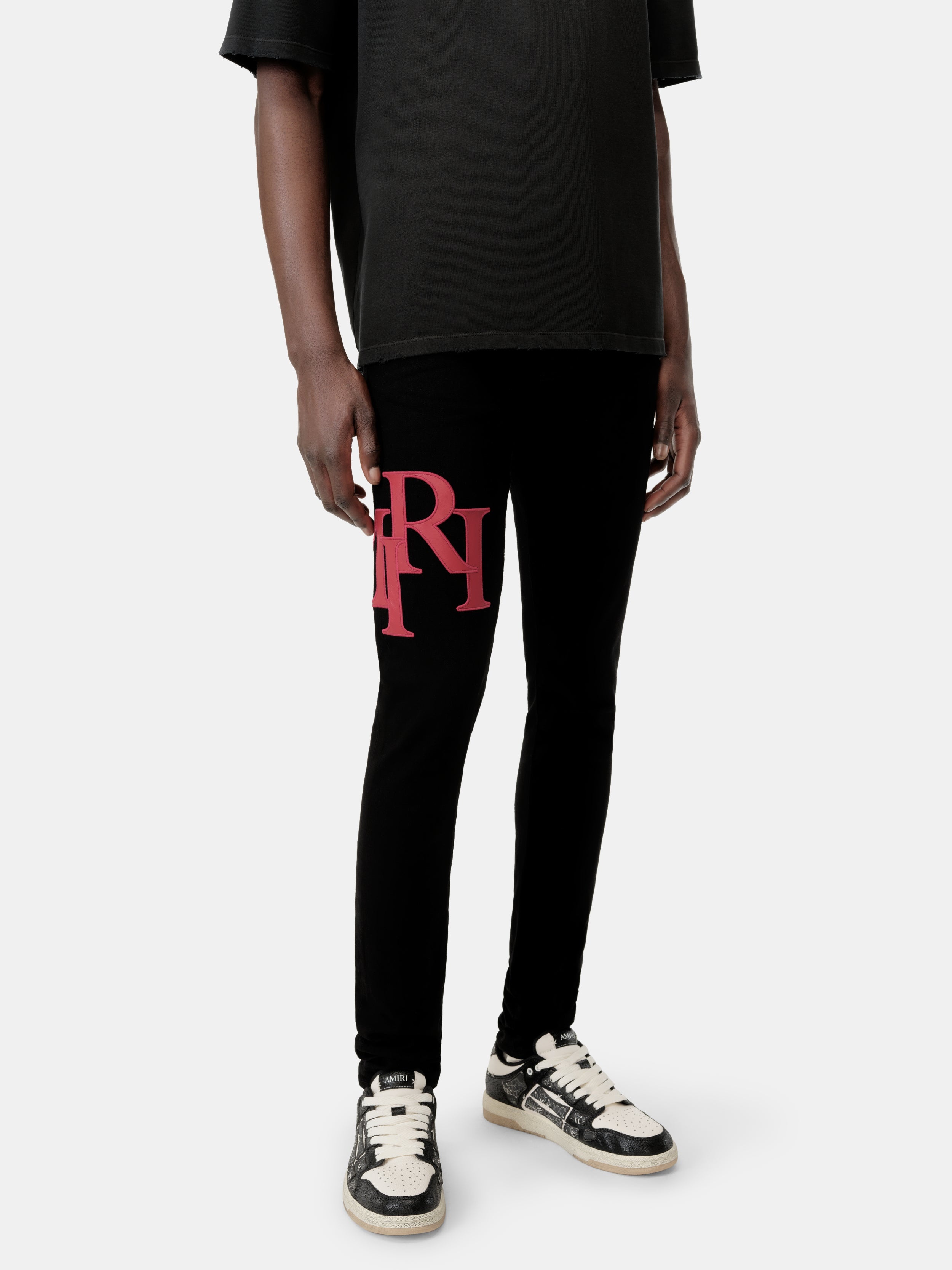 STAGGERED LOGO SKINNY JEAN- Black Red - 5
