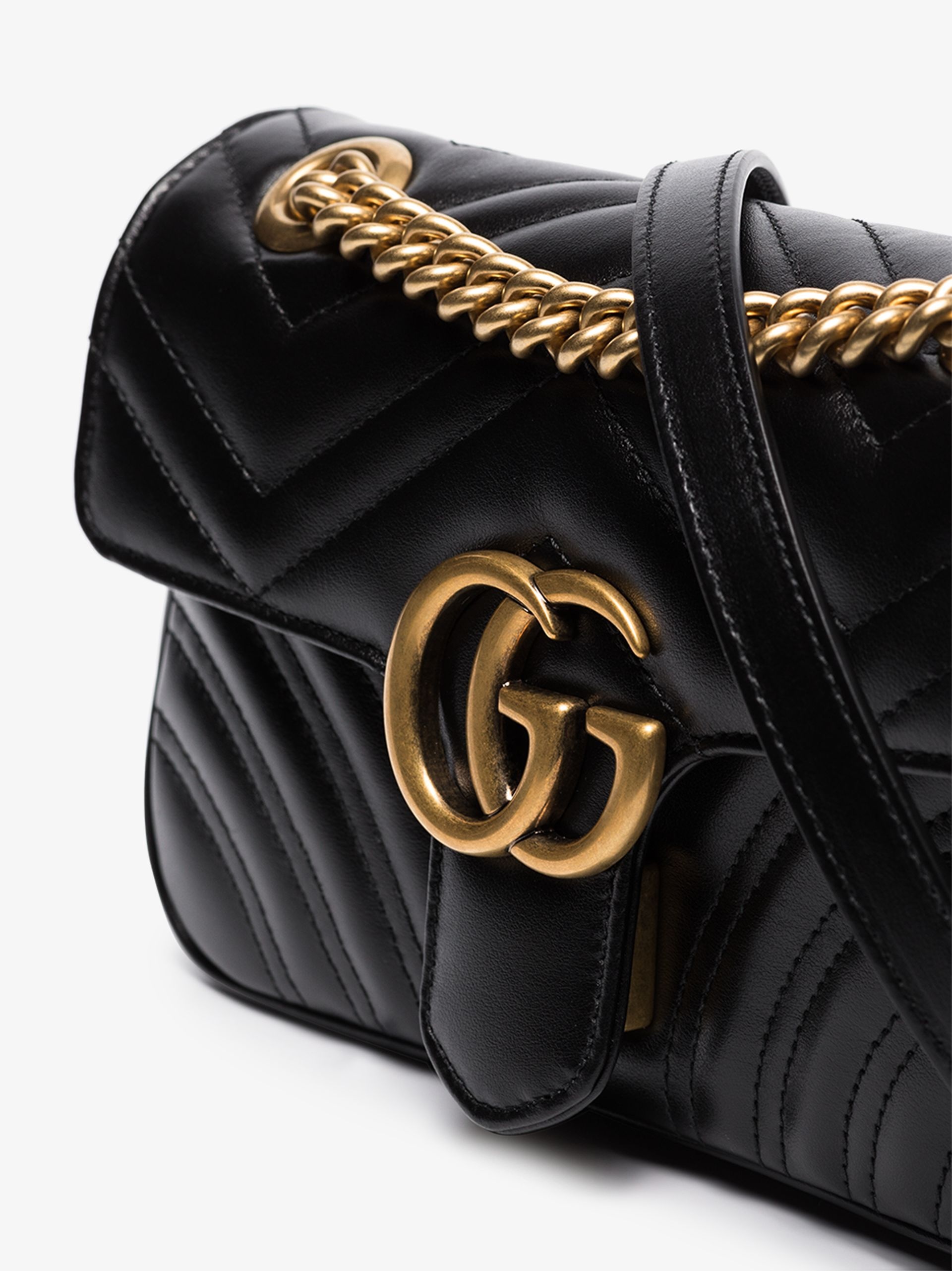 GUCCI black GG Marmont matelassé mini bag | brownsfashion GUCCI black GG Marmont matelassé mini bag | brownsfashion