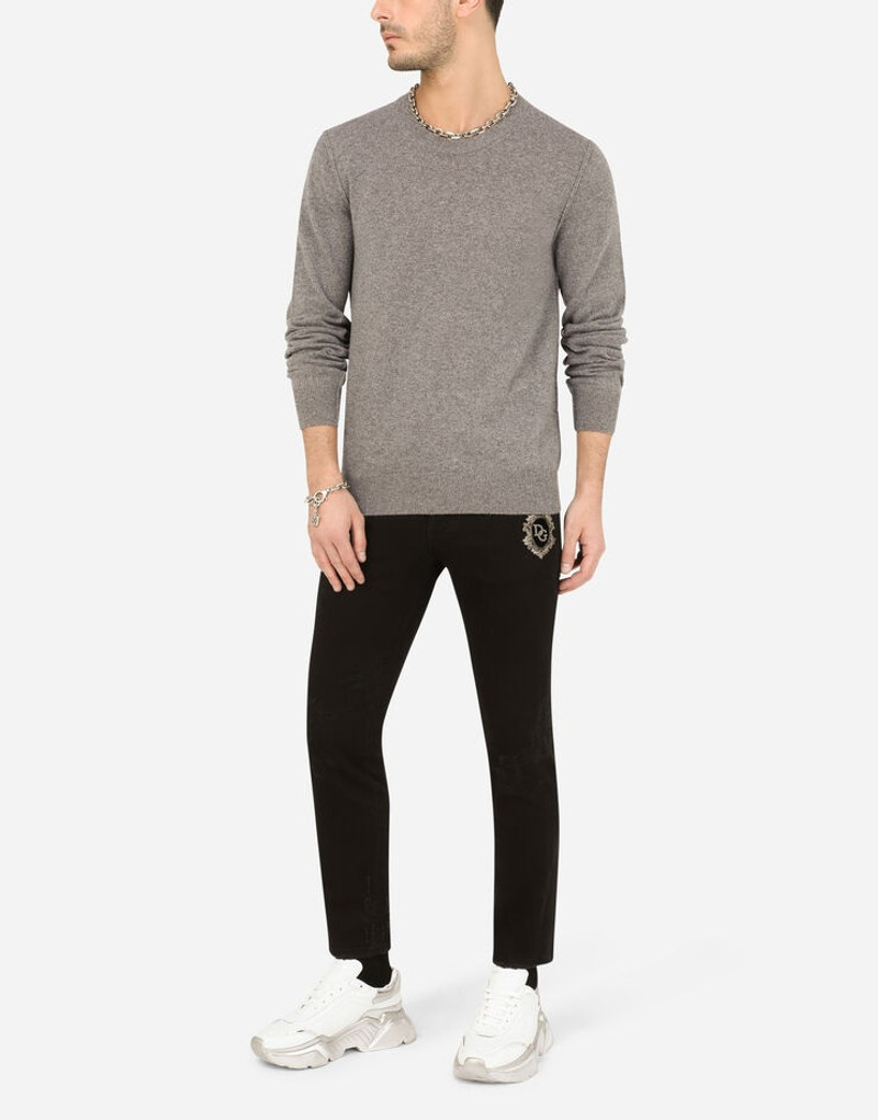 Black repaired skinny jeans with DG patch 6