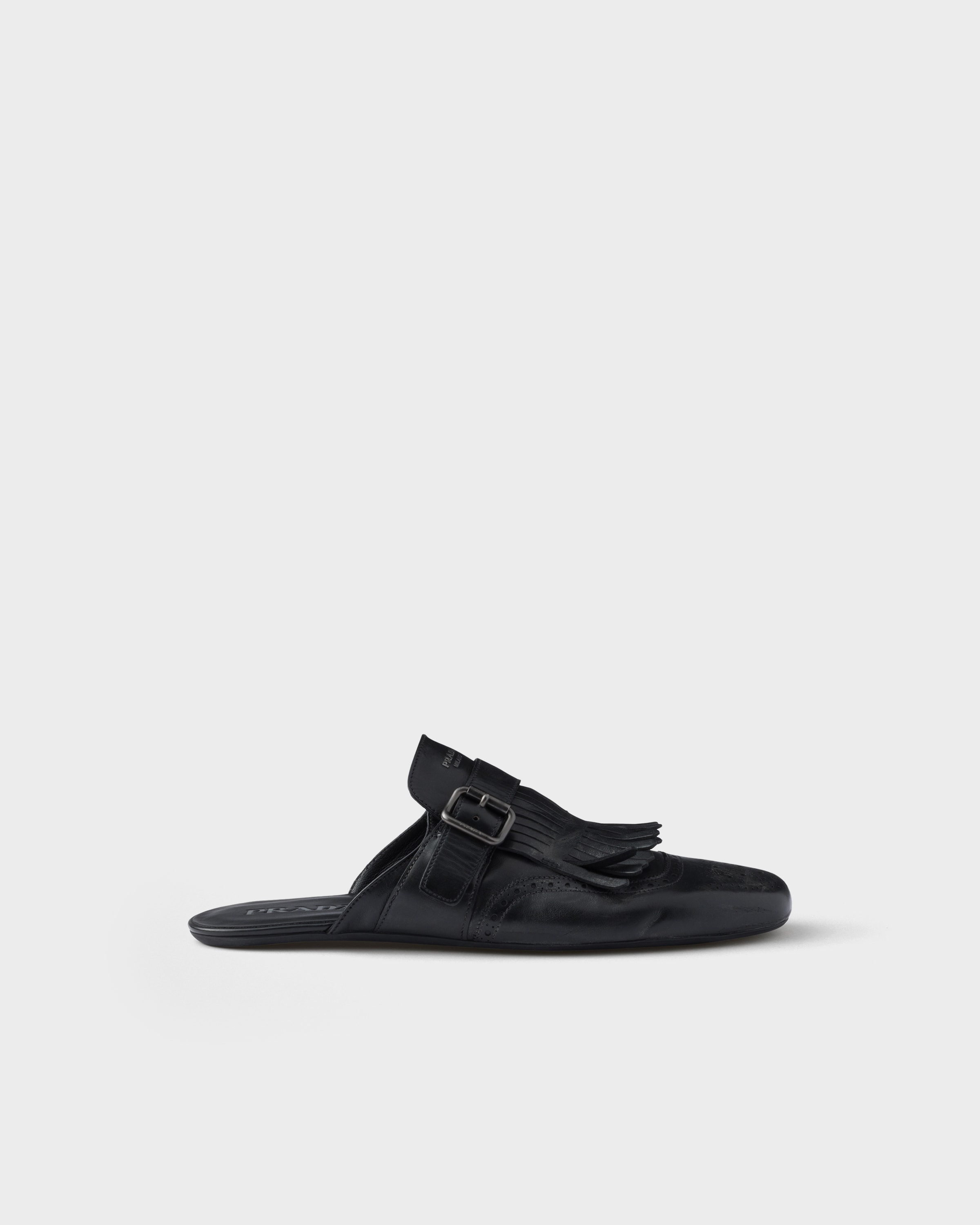 Shuffle antiqued leather mules with buckled strap and fringe - 2