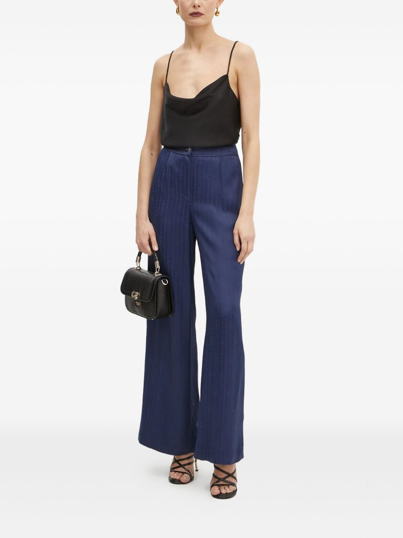 GUESS USA button-fastening pattern trousers outlook