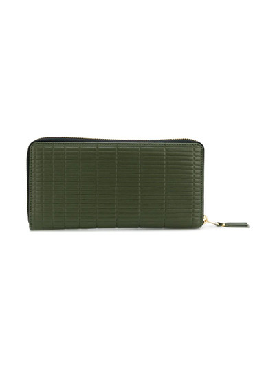 Comme Des Garçons embossed zip around wallet outlook