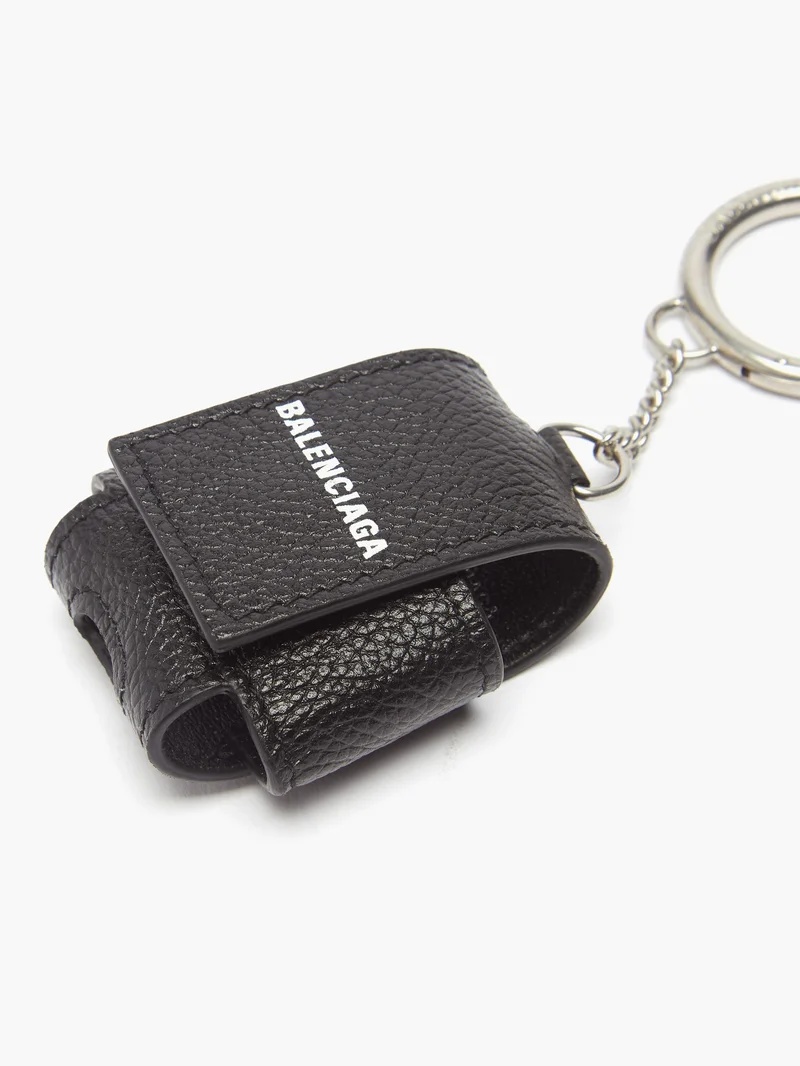 BALENCIAGA Logo-print leather AirPods case | matchesfashion