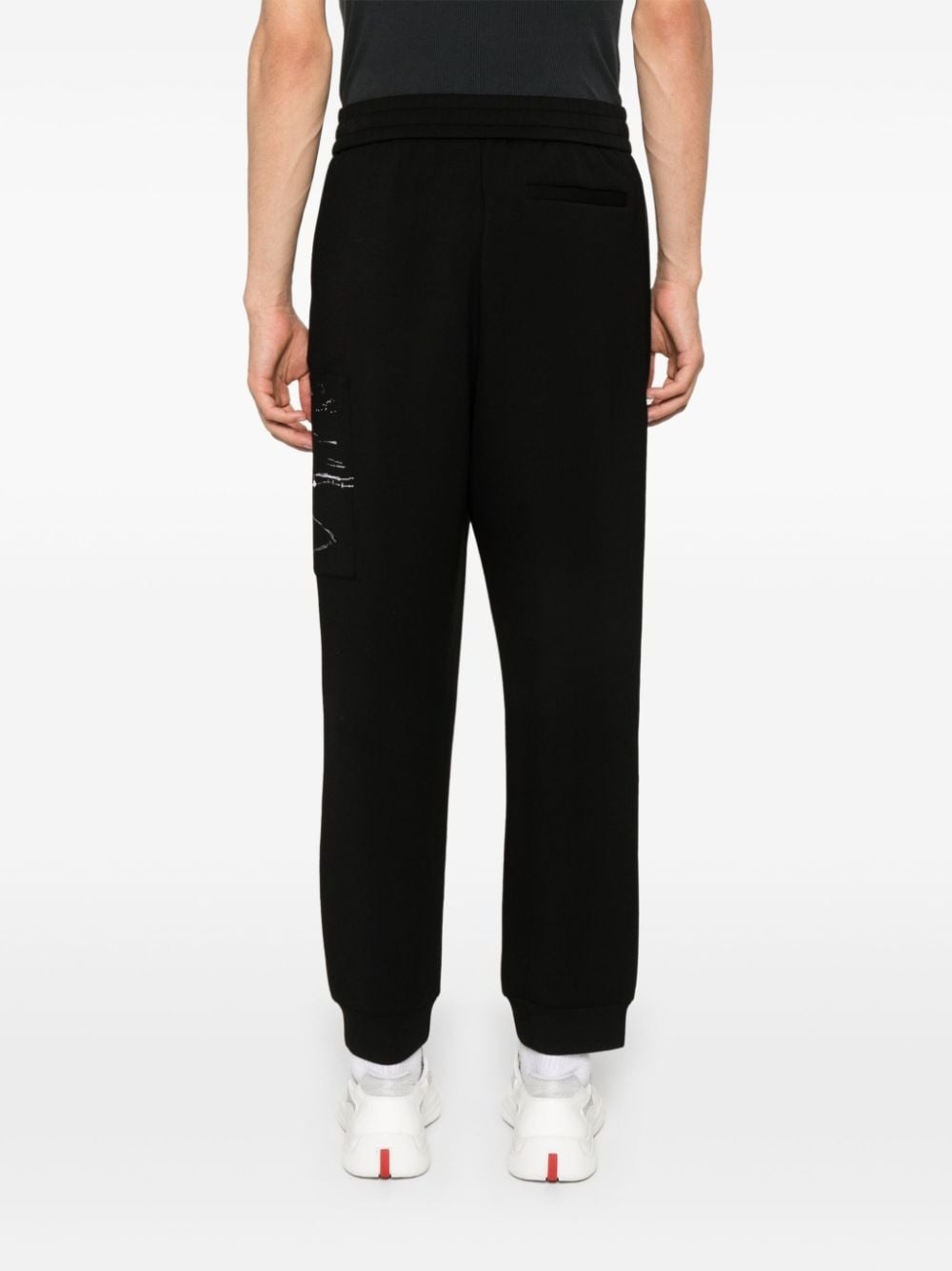 graphic-print tapered trousers - 4