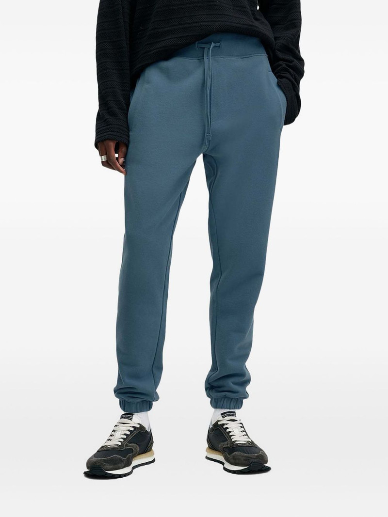 Raven logo-embroidered track pants 1