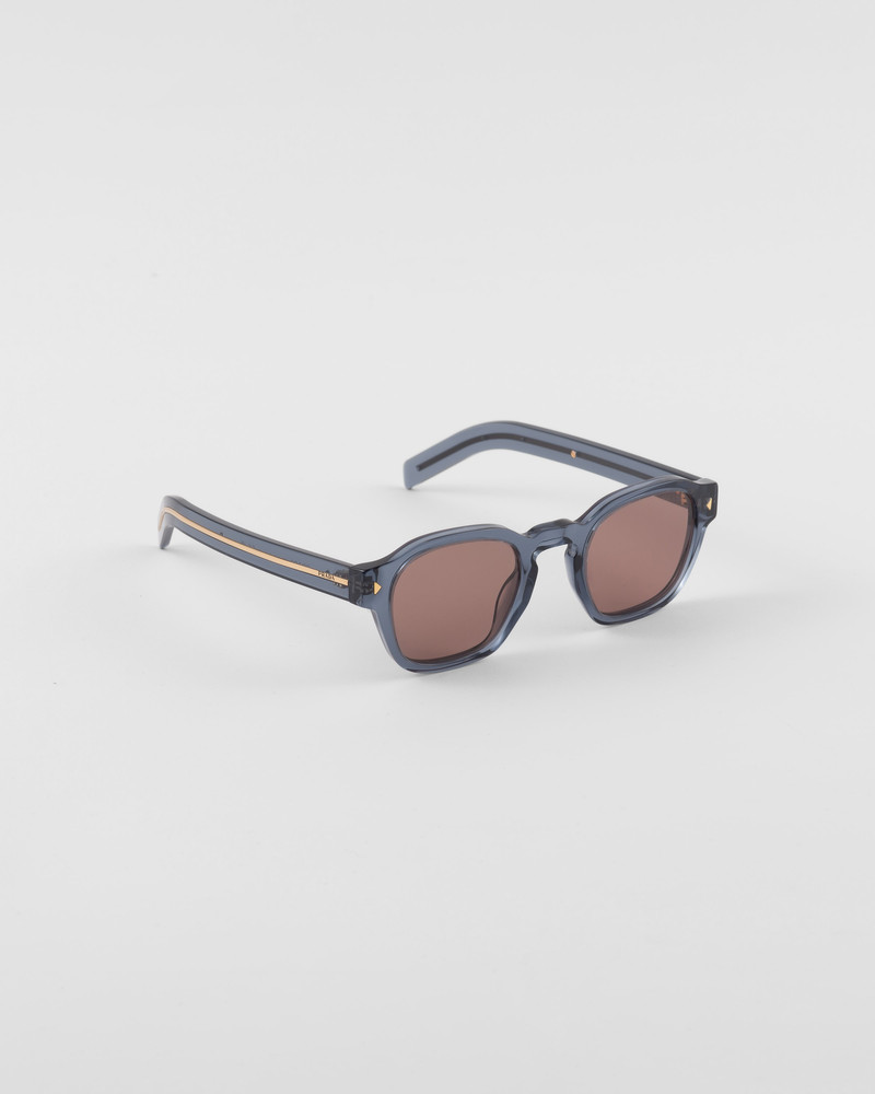Prada Sunglasses with iconic metal plaque outlook