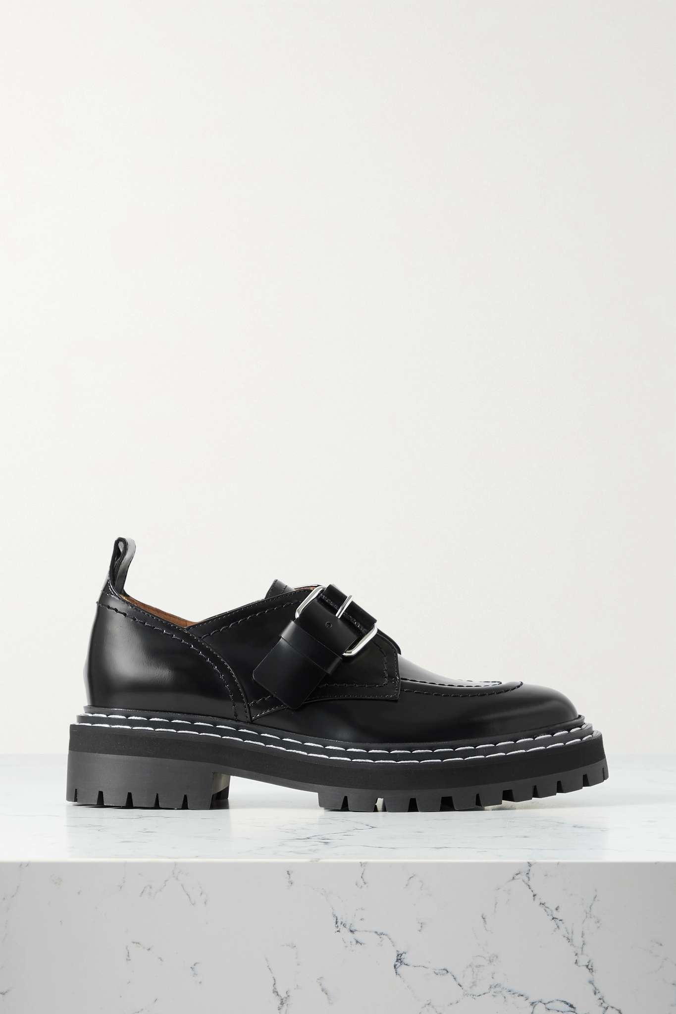 Buckled glossed-leather loafers - 1