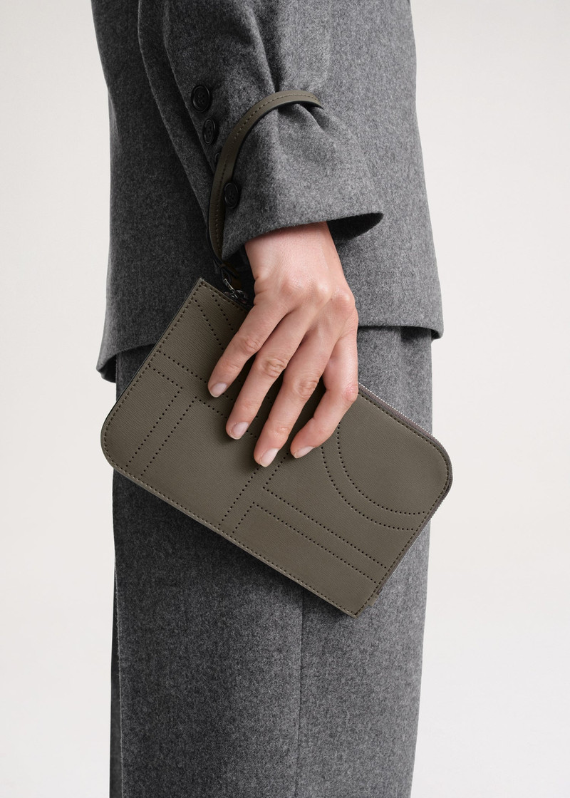 Totême Monogram leather wristlet pouch ash outlook