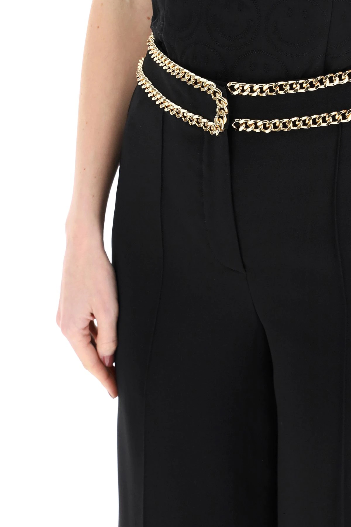 CROP TROUSERS WITH GROUMETTE CHAINS - 5