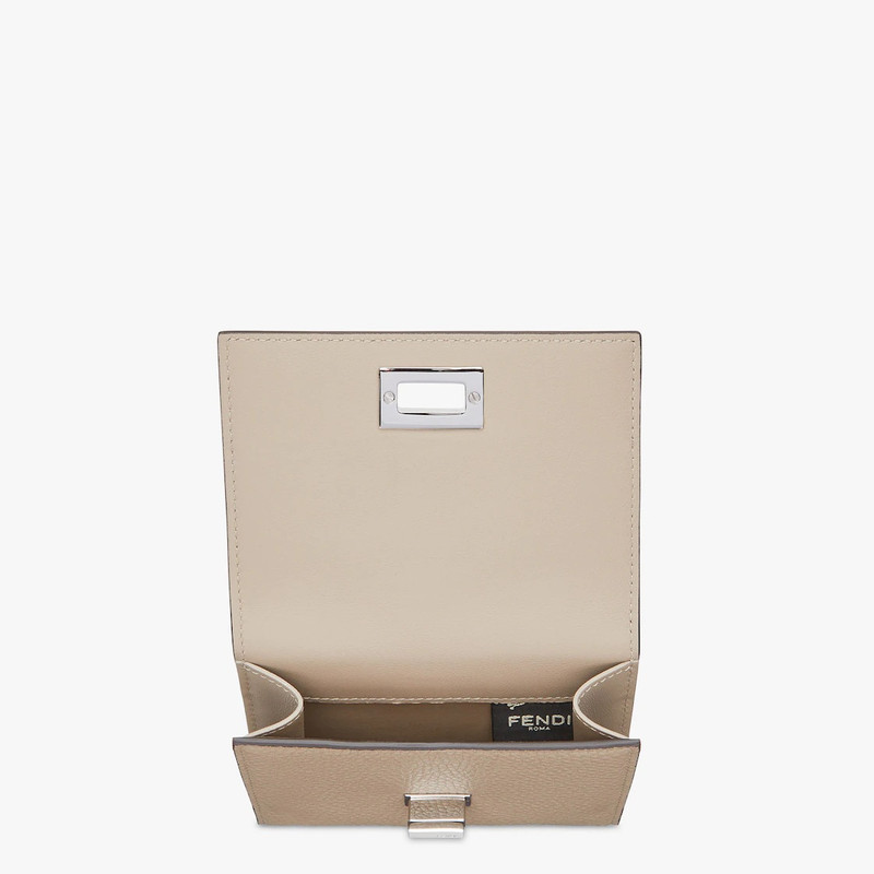 FENDI Compact, tri-fold Peekaboo Selleria wallet with large internal bill compartment and three concealed  outlook