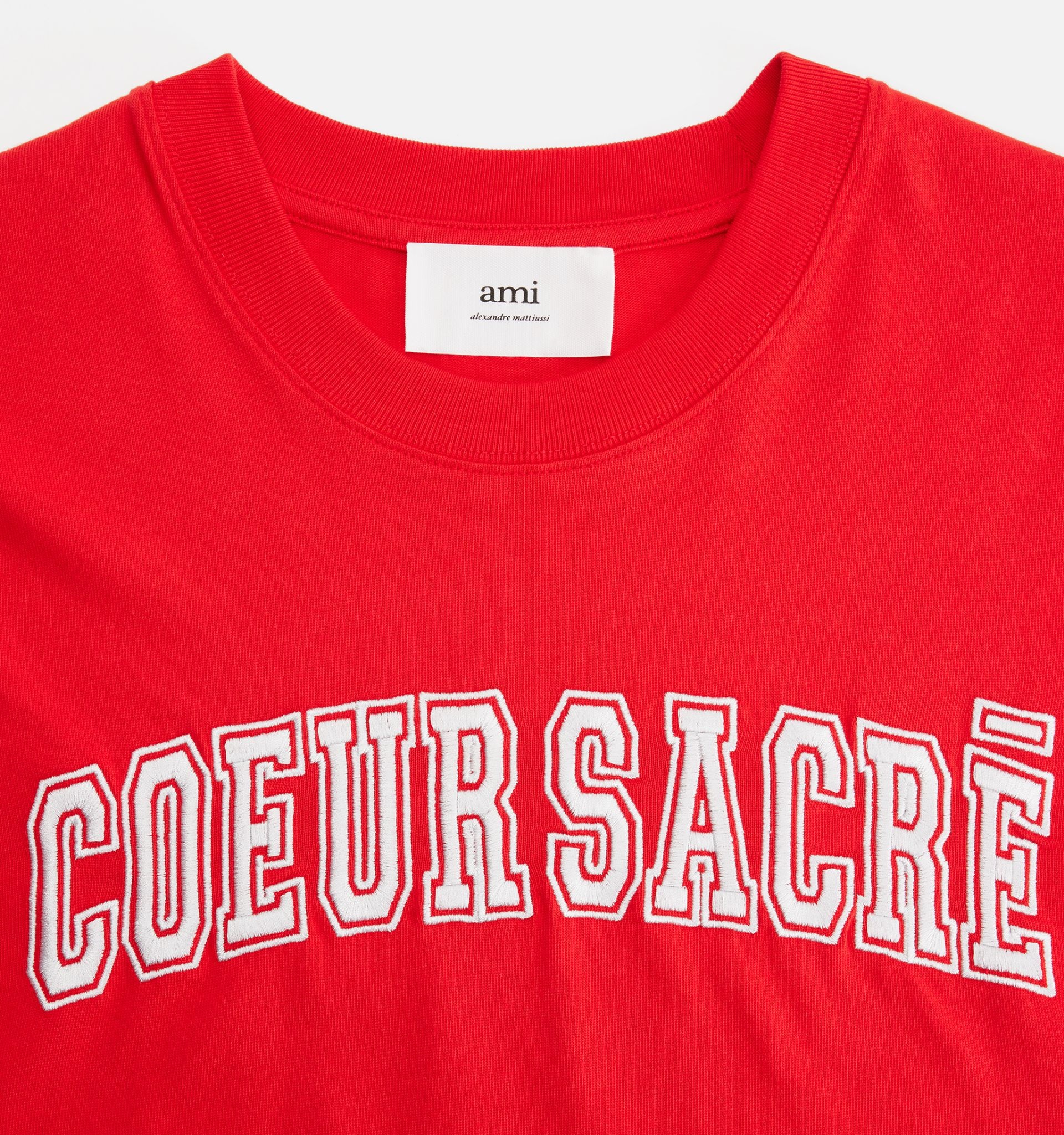 【関税込み】AMI Paris レッド Coeur Sacre Tシャツ AMI Paris Coeur Sacré T-Shirt | REVERSIBLE