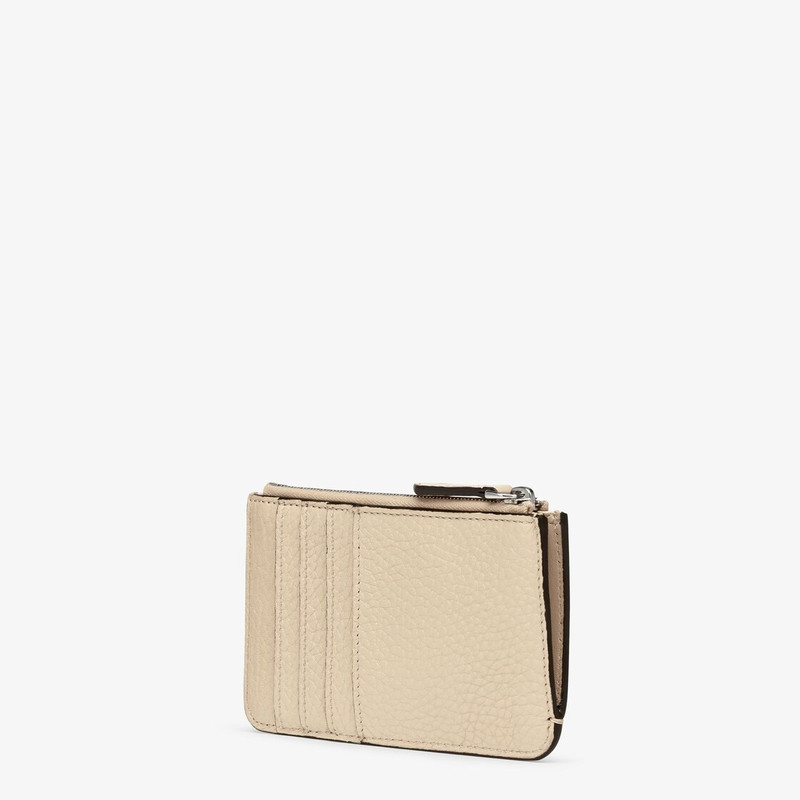 Fendi Roma key pouch with gusseted sides. The back features four card slots. Inside there is a pull- 2