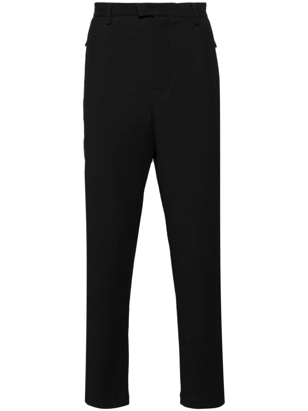 seersucker-textured tapered-leg trousers - 1