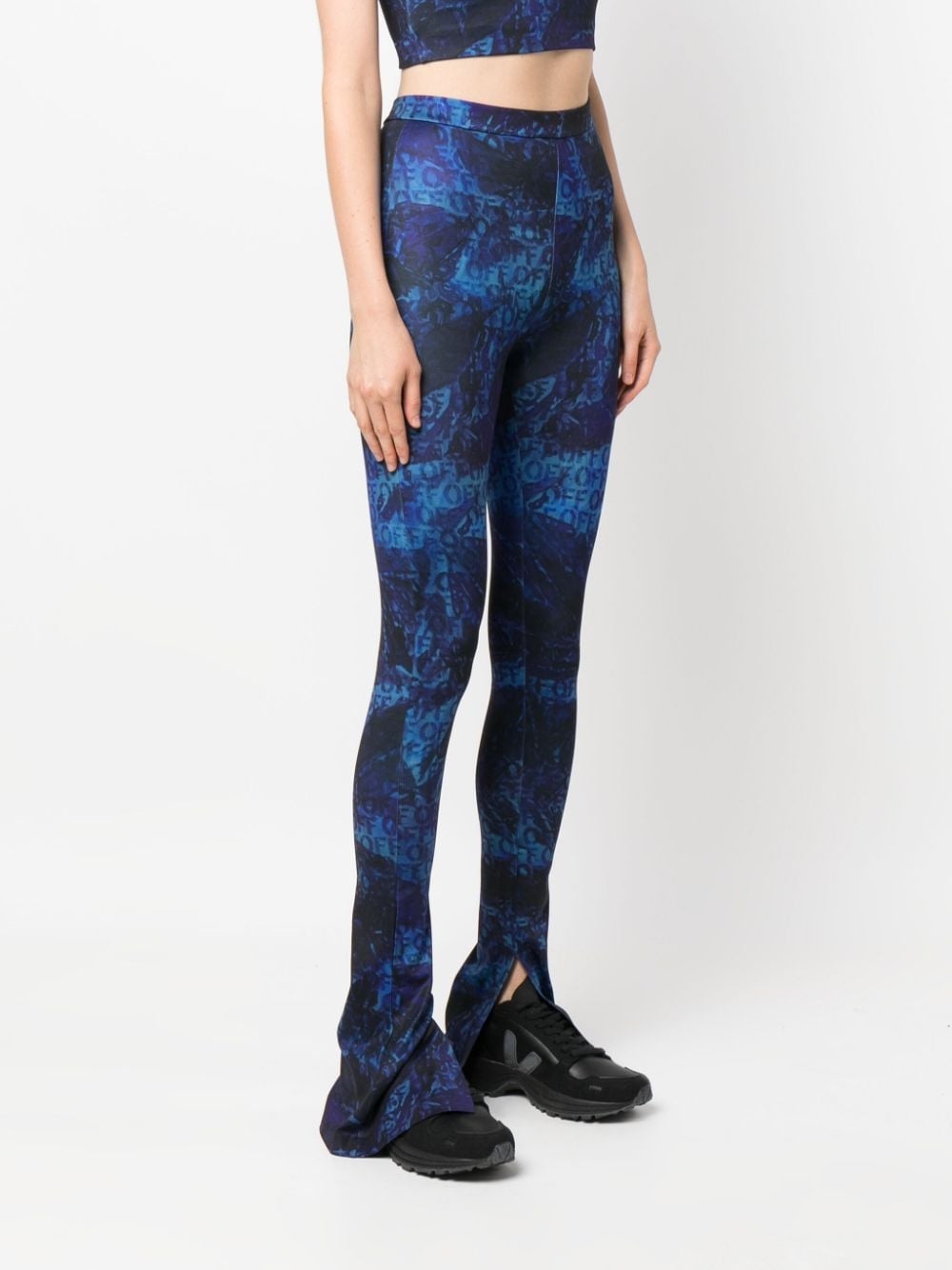 all-over logo-print flared trousers - 3