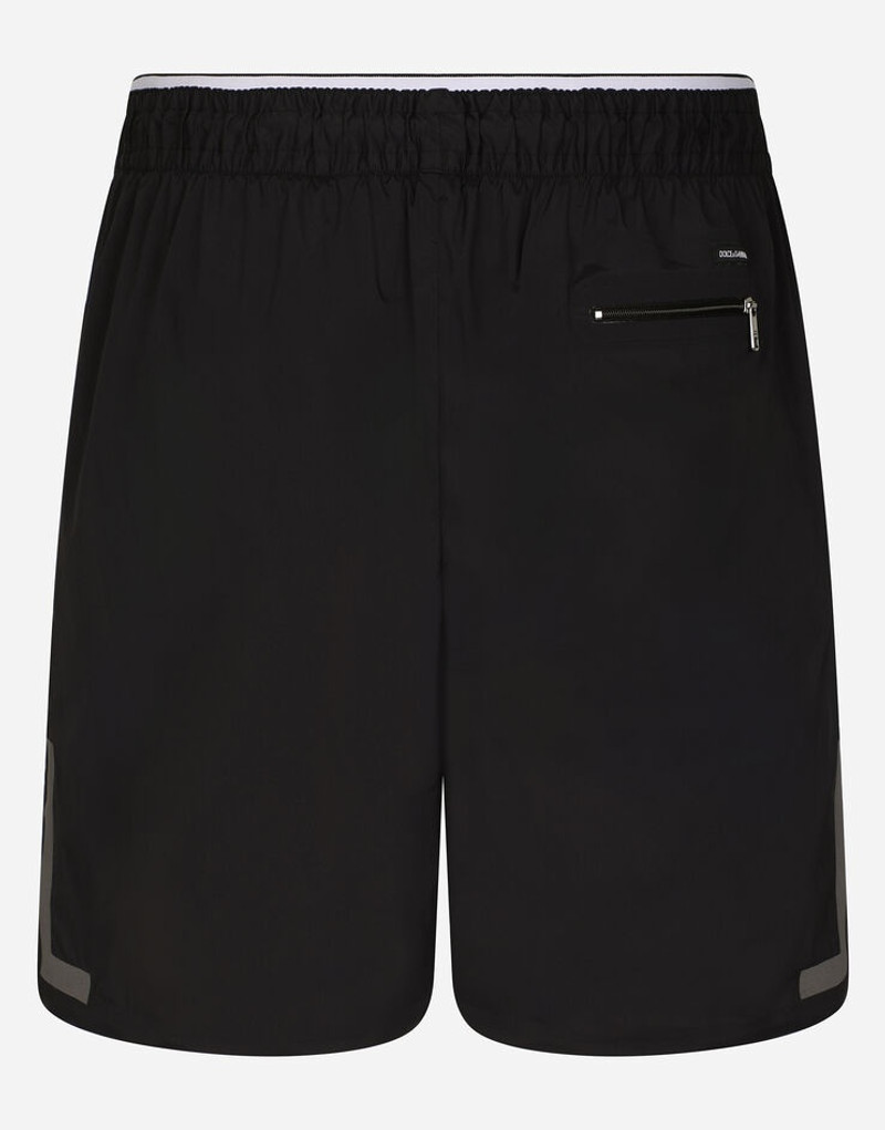 Dolce & Gabbana Mid-length swim trunks with DG logo patch outlook