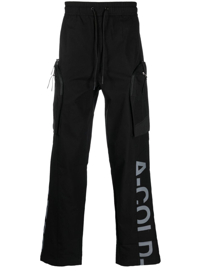 Overset Tech logo-print trousers 1