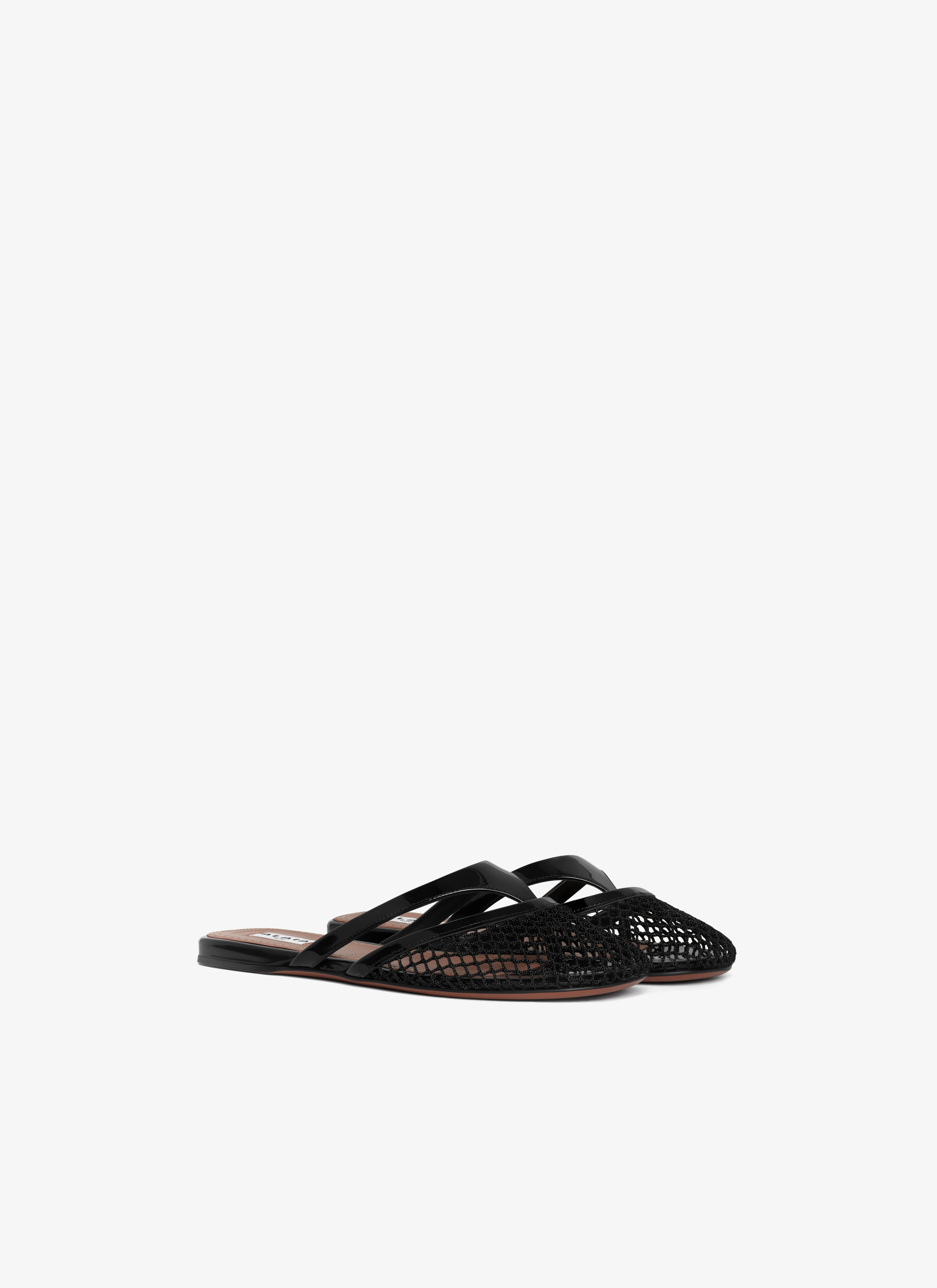 Alaïa INFRADITO FLAT MULES IN FISHNET AND LEATHER | REVERSIBLE
