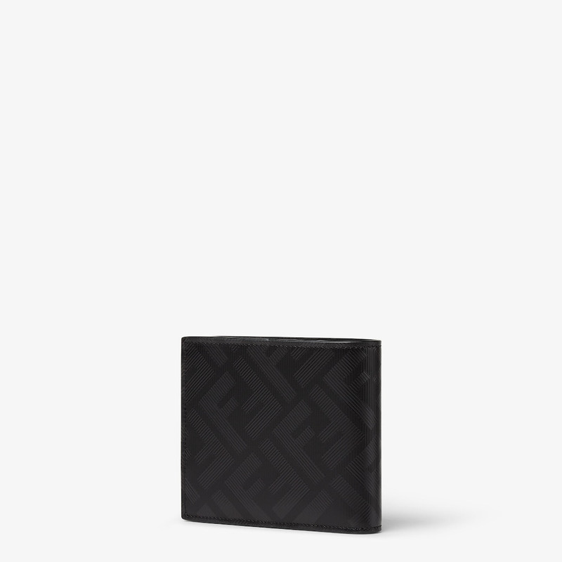 Wallet with eight interior card slots and two compartments for banknotes. Made of black leather with 3