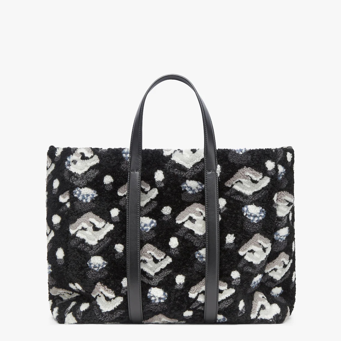 Roomy shopper made of soft curly sheepskin with FF inlay in black, gray and white. Features a fabric - 1