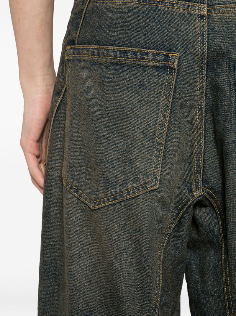 twisted zipped-pockets jeans 5