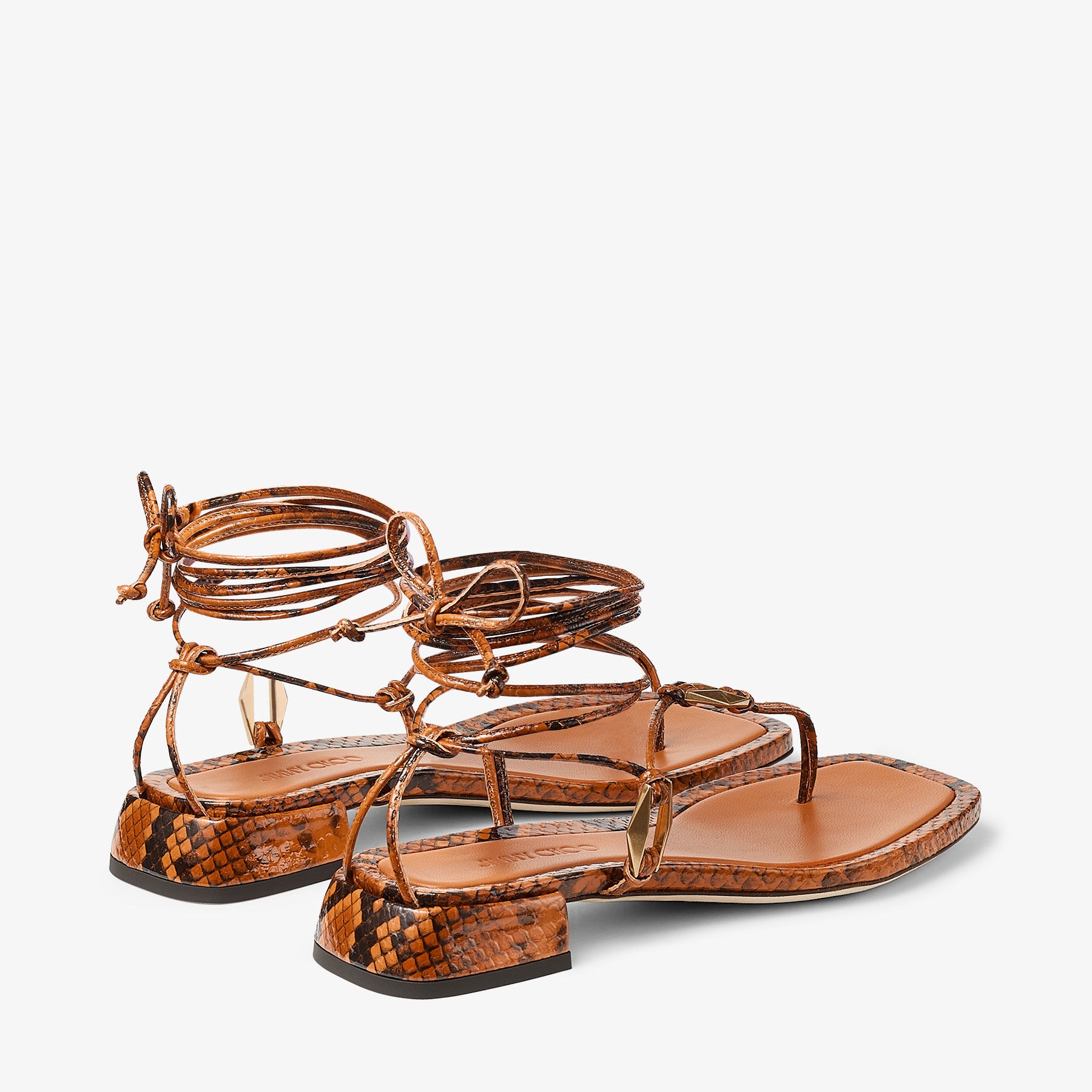 Onyxia Flat
Copper Snake Print Sandals - 5