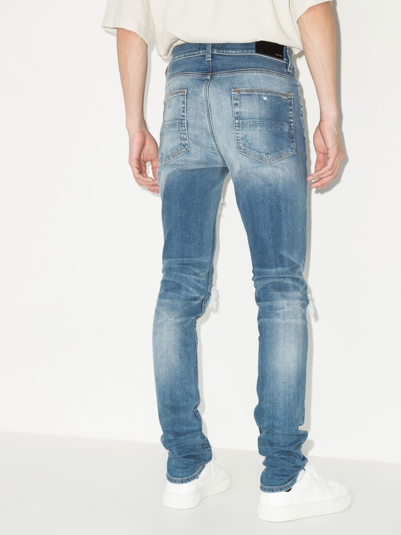distressed-effect skinny jeans 3