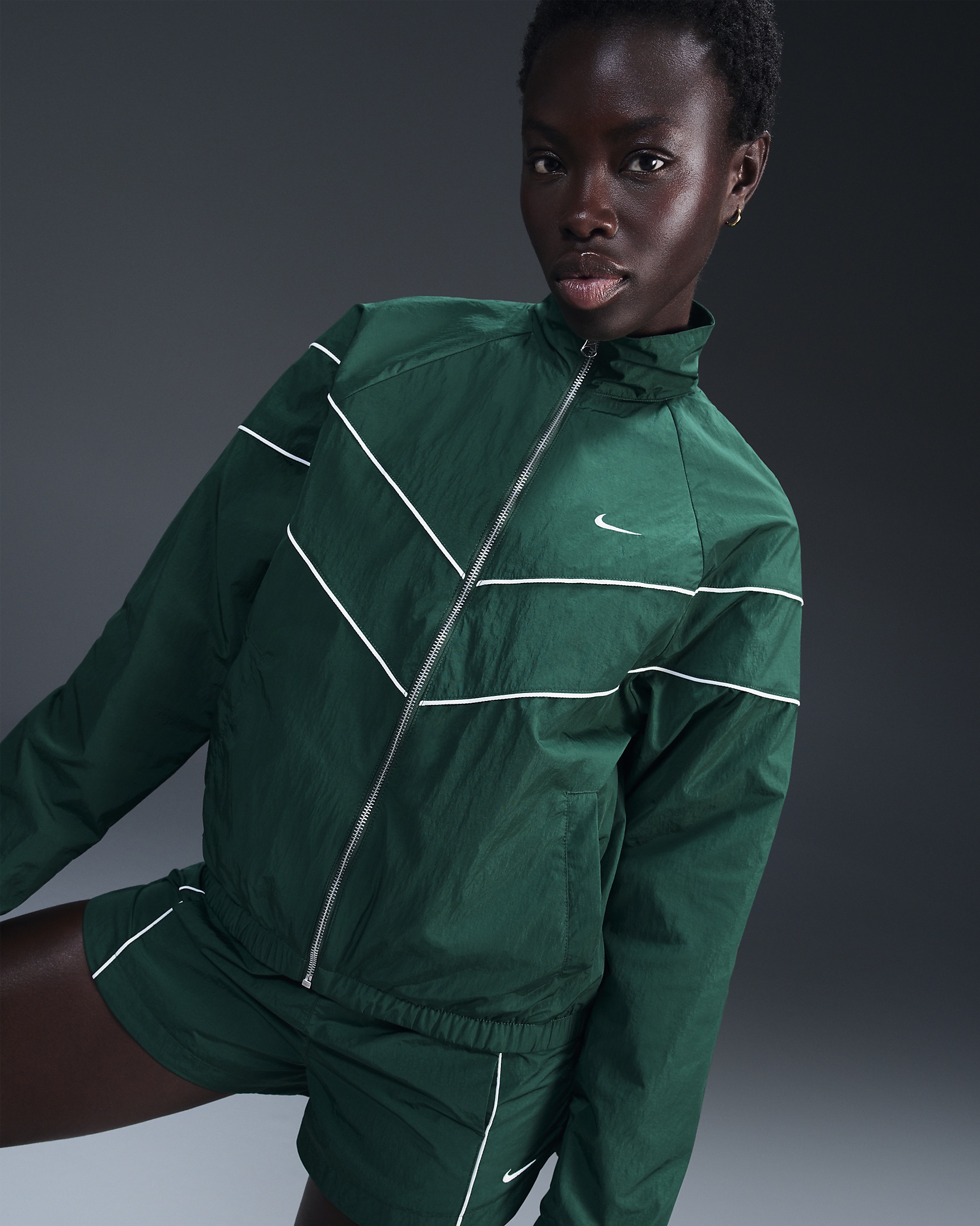 Nike Windrunner Women's Loose UV Woven Full-Zip Jacket - 1
