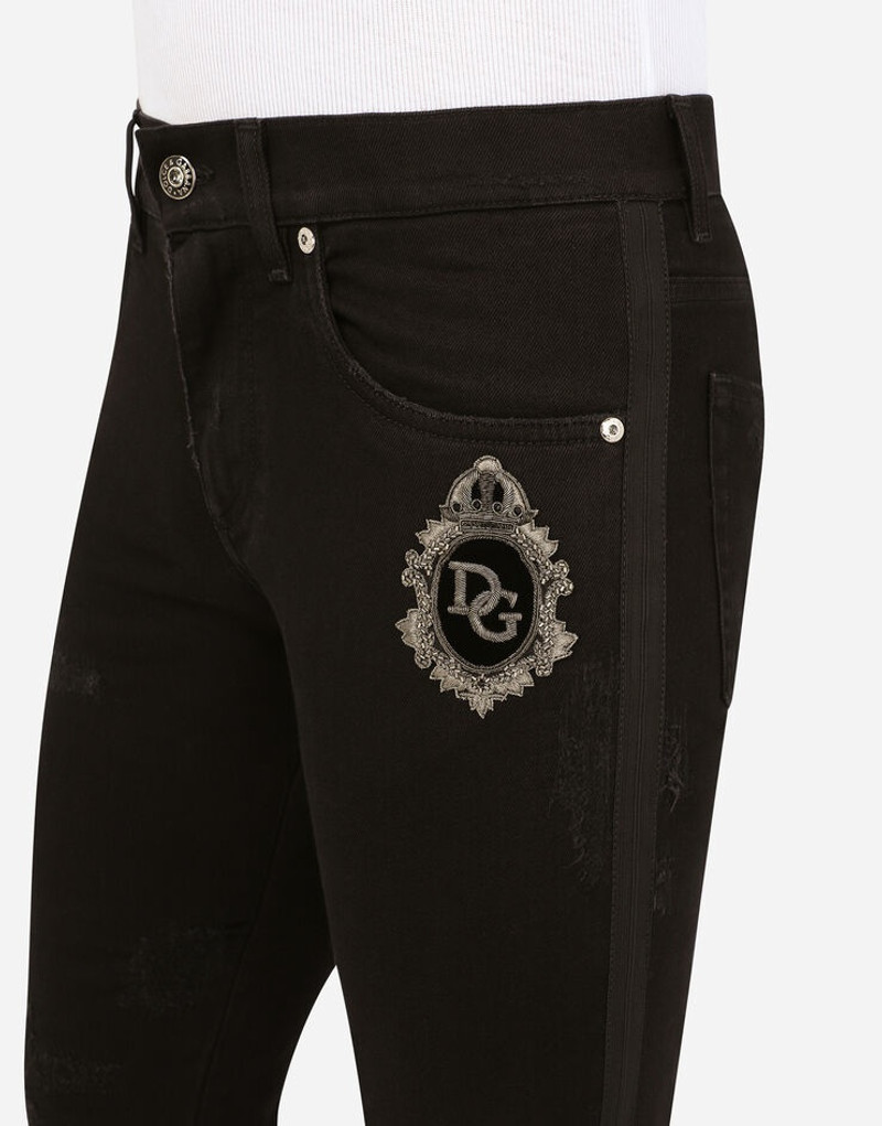 Black repaired skinny jeans with DG patch 4