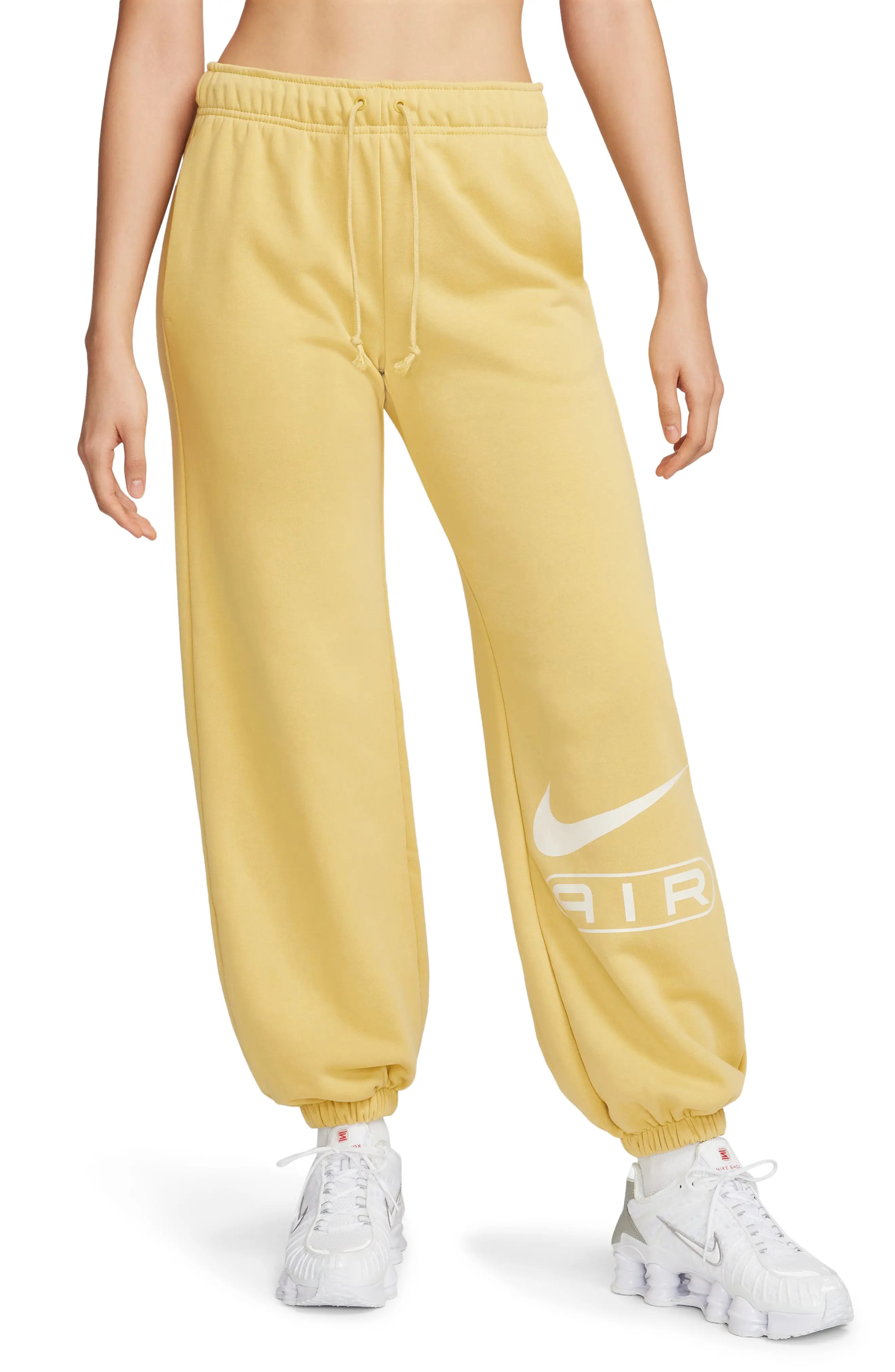Nike gold sweatpants hotsell