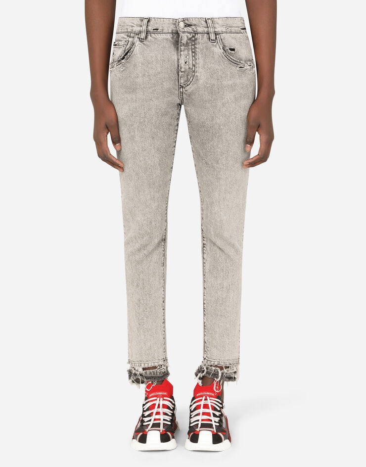 Gray skinny stretch jeans with ripped hems - 1