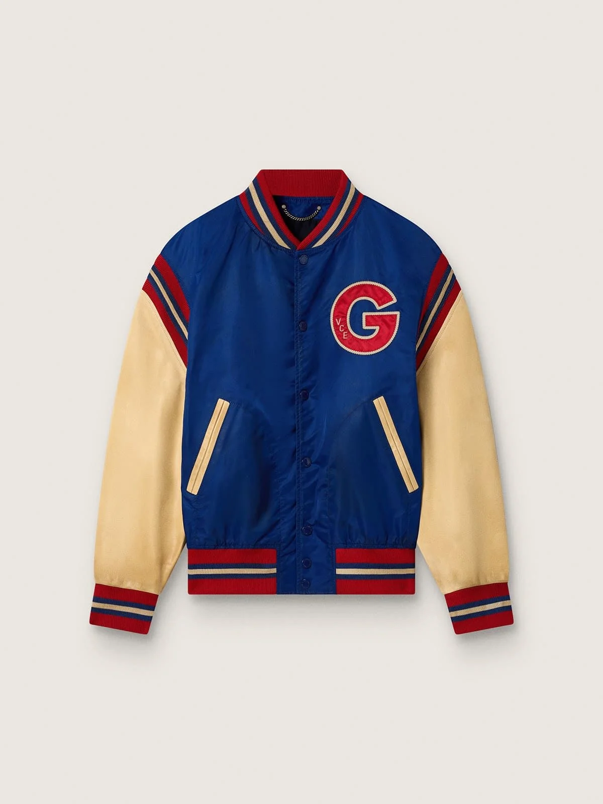 Men's blue varsity bomber jacket with beige leather sleeves - 1