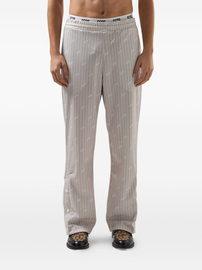 GCDS pinstripe logo-motif track pants outlook
