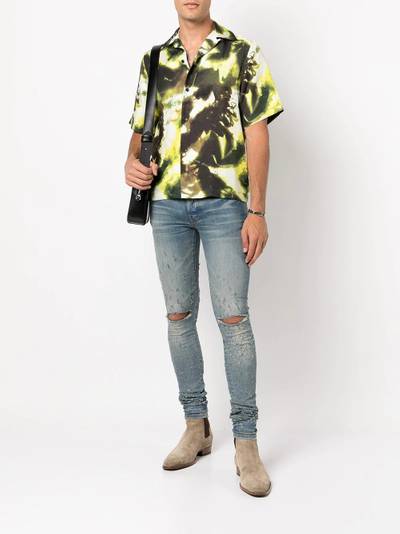 AMIRI distressed skinny jeans outlook