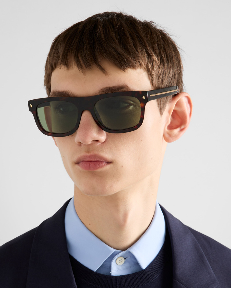 Prada Sunglasses with the iconic metal plaque outlook