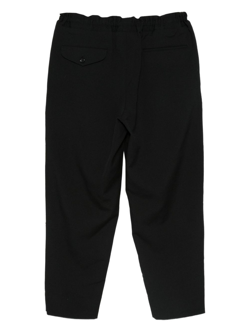 BLACK COMME des GARÇONS elasticated-waist wool trousers outlook