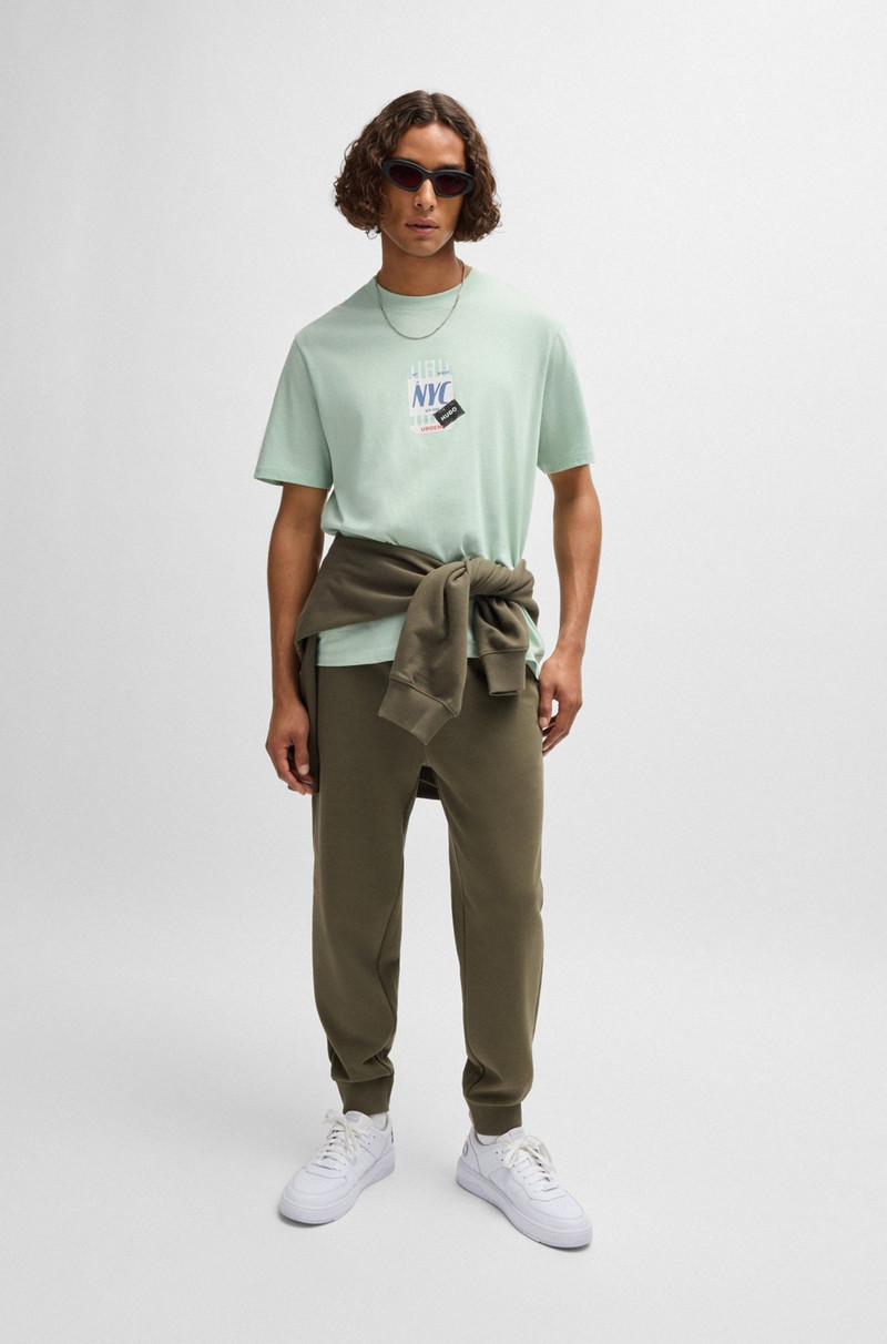 HUGO COTTON-JERSEY T-SHIRT WITH TRAVEL-TAG ARTWORK outlook