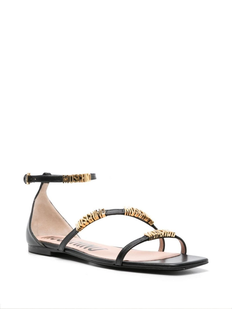 Moschino logo-lettering leather sandals outlook