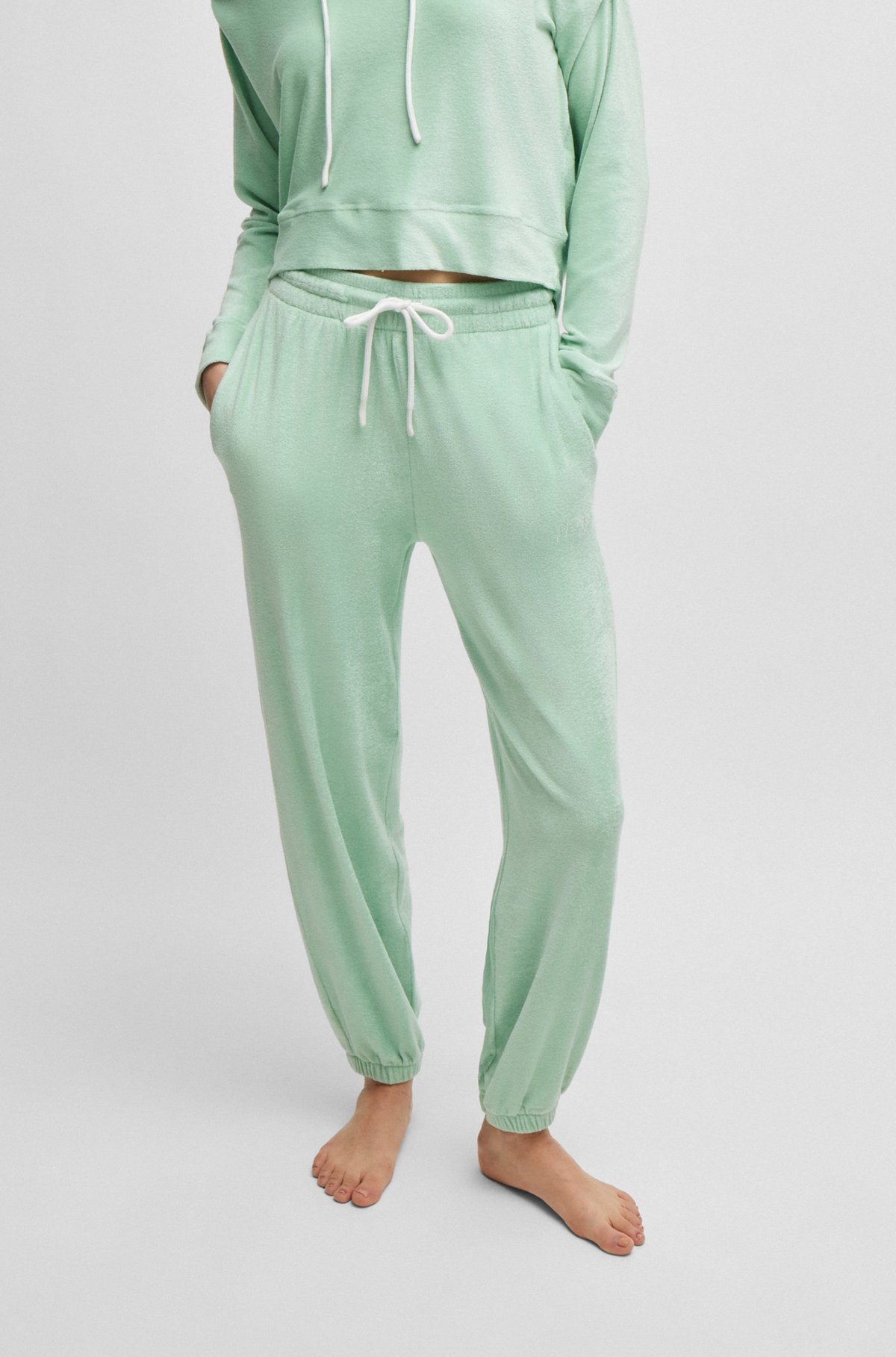 CUFFED TRACKSUIT BOTTOMS IN TERRY FABRIC WITH HANDWRITTEN LOGO - 2