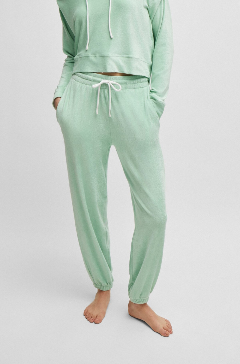 HUGO CUFFED TRACKSUIT BOTTOMS IN TERRY FABRIC WITH HANDWRITTEN LOGO outlook