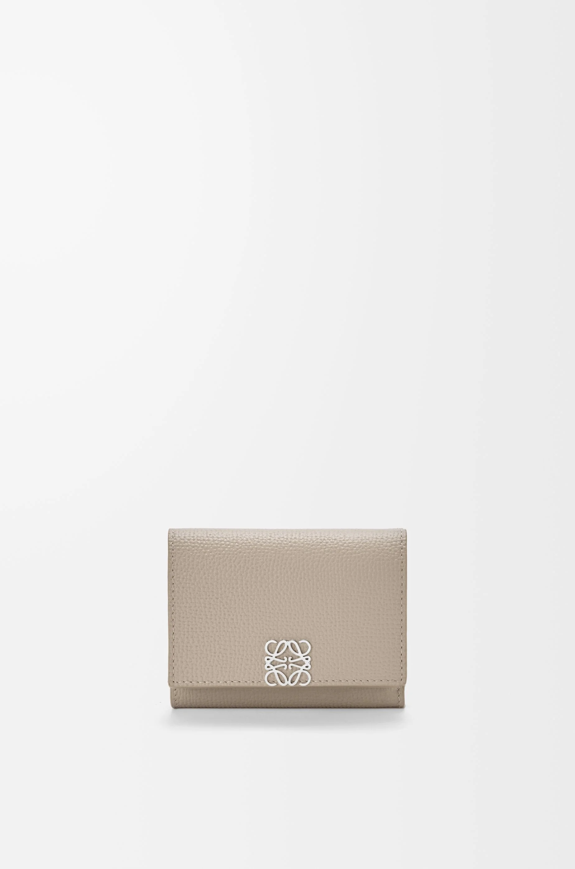 Anagram trifold wallet in pebble grained calfskin - 1