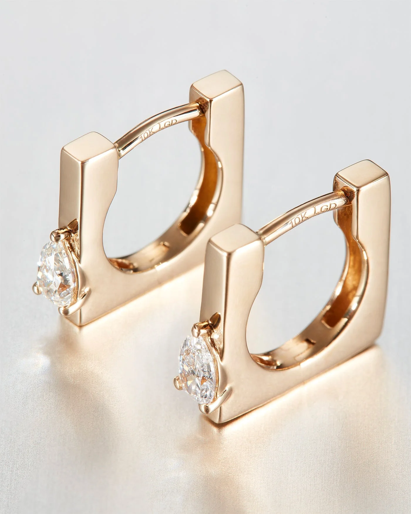 10K Pear Cut Diamond Huggie Earrings - 1